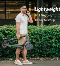 Woman riding EcoBike 500W adult electric scooter 25kmh 150kg load — buy electric scooter for adults Australia
